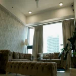 4 BHK Lodha Marquise Lower Parel Tufted Sectional Sofa Textured Wall Sheer Curtain Cityview Living Room