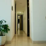 4 BHK Lodha Marquise Lower Parel Wide Corridor Monstera Plant Multi Room Hallway