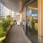 4 BHK Lodha World Crest Lower Parel Lush Plant Lined Teak Deck Glass Railing Skyline View Wide Balcony