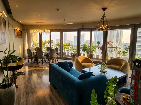 4 BHK Lodha World Crest Lower Parel Teal Sectional Yellow Armchair Chandelier Floor To Ceiling Cityview Living Dining
