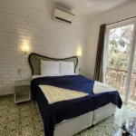4 BHK Villa Magic Arr Estate Goa Bedroom With Balcony Access And Forest View