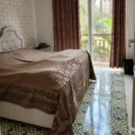 4 BHK Villa Magic Arr Estate Goa Bedroom With French Window And Natural Light