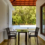 4 BHK Villa Magic Arr Estate Goa Private Balcony Seating Space With Forest Backdrop
