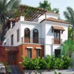 4 BHK Villas Elements Nachinola Goa Portuguese style villa elevation with arched windows tiled roof rooftop pergola