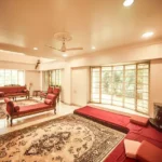 6 BHK Villa Clover Hills Kondhwa Pune Large Living Room With Wide Window Garden View