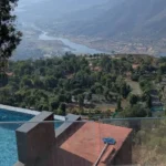 7 BHK Villa Panchgani Mahabaleshwar Amenities Infinity Pool Area With Glass Railing Overlooking Valley Landscape