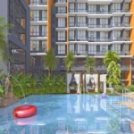 Agarwal Florence SV Road Goregaon West Swimming Pool With Landscape Deck Tropical Plantation And Residential Tower View