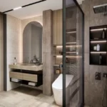 Agarwal Floresta Upper Govind Nagar Malad East 3 BHK Luxury Bathroom Interior With Stone Finish Walls Floating Wash Basin Glass Partition
