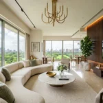 Anupama 6th Road Chembur 3 BHK Living Room With Curved Sofa And TV Wall