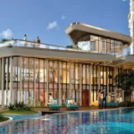 Ashar Merac Wagle Estate Thane West Clubhouse With Glass Facade Poolside Seating Contemporary Architecture And Premium Leisure Amenities