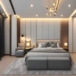 Asopalav Kandivali West 3 BHK spacious master bedroom interior with padded wall panels modern chandelier accent chair and soft lighting