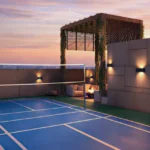 Asopalav Kandivali West rooftop badminton court with pergola seating ambient lighting
