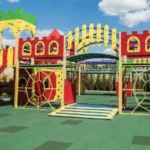 Auriga 9 Borivali West Colourful Castle Theme Slide Climbing Net Rubber Floor Open Air Kids Play Area