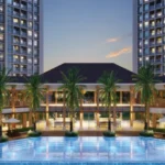 Aurum Q Islands Ghansoli Navi Mumbai Palm Lined Dusk Lit Clubhouse Facade Podium Swimming Pool Tower Amenity