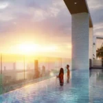 Aviara Malad West Rooftop Infinity Pool With Glass Railing Skyline Sunset Views Luxury Leisure Space
