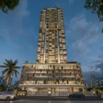 Breeze 91 Borivali West Dusk Lit Glass Facade Podium Palm Tree Single High Rise Tower Street Level Exterior