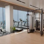Claremont Gokuldham Goregaon East Gym Facility With Treadmills Weight Machines Full Glass Windows And Modern Fitness Setup