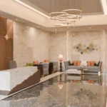 Claremont Gokuldham Goregaon East Entrance Lobby With Seating Area Decorative Wall Panels Marble Flooring And Premium Interior Finish
