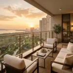 Hiranandani Westgate Thane 3 BHK Balcony Seating Area With Outdoor Sofa Armchairs Glass Railing Sunset Skyline View
