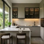 Isle Of Calm Powai 2 BHK compact modern kitchen with breakfast counter soft lighting and large sliding windows