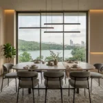 Isle Of Calm Powai 2 BHK dining area with floor to ceiling windows overlooking Powai lake and skyline views