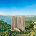 Isle Of Calm Powai aerial tower elevation surrounded by lush green hills and Powai lake landscape