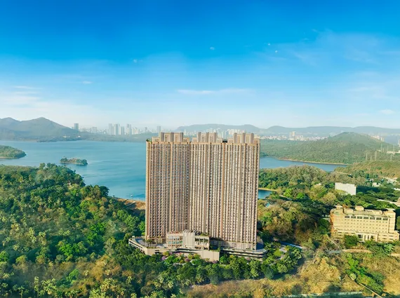 Isle Of Calm Powai aerial tower elevation surrounded by lush green hills and Powai lake landscape