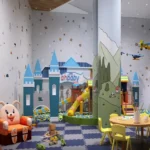 Isle Of Calm Powai indoor kids play area with colorful activity zones, slides and soft flooring