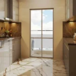 La Mer Mumbai Central Modern Kitchen With Parallel Counter Layout Wooden Cabinets Marble Flooring And Bright Window Lighting