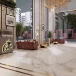La Mer Mumbai Central Luxury Lobby Lounge With Double Height Ceiling Marble Flooring Designer Seating And Coffee Counter