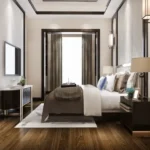 Luminaara 10th Road Khar West 3 BHK Bedroom Interior With Wooden Flooring Neutral Wall Panels King Size Bed