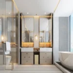 One Vara Goregaon East 3 BHK Warm Lit Twin Vanity Freestand Tub Glass Partition Bathroom