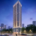 One Vara Goregaon East Single High Rise Gold Facade Tree Lined Dusk Exterior