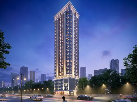 One Vara Goregaon East Single High Rise Gold Facade Tree Lined Dusk Exterior