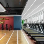 Piramal Revanta Mulund West Don't Quit Neon Wall Treadmill Row Spin Cycle Zone Glazed Window Gymnasium