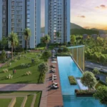 Purva Panorama Ghodbunder Road Thane infinity pool with open green lawn and tower surroundings