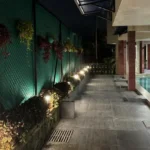 R Paradise Tungarli Lonavala 6 BHK Villa Poolside Walkway With Landscape Lighting
