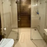 R Paradise Tungarli Lonavala 6 BHK Villa Bathroom With Glass Shower Enclosure