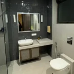 R Paradise Tungarli Lonavala 6 BHK Villa Bathroom With Mirror And Vanity Setup