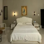 R Paradise Tungarli Lonavala 6 BHK Villa Master Bedroom With Classic Interiors
