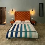R Paradise Tungarli Lonavala 6 BHK Villa Bedroom With Upholstered Orange Headboard
