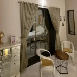 R Paradise Tungarli Lonavala 6 BHK Villa Bedroom Seating Area With Balcony Access