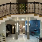 R Paradise Tungarli Lonavala 6 BHK Villa Double Height Living Room With Staircase