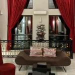 R Paradise Tungarli Lonavala 6 BHK Villa Living Room With Luxury Seating And Curtains