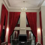 R Paradise Tungarli Lonavala 6 BHK Villa Double Height Living Room With Red Curtains