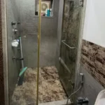 Resale 4 BHK Oberoi Springs Andheri West Bathroom With Glass Shower Area Modern Fixtures And Designer Tile Finish