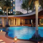 Runwal Lands End Kolshet Road Thane West Podium Level Swimming Pool With Deck Seating Ambient Lighting Landscaped Surroundings