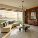 Sector 6 Vashi Navi Mumbai 3 BHK Cream Curved Sofa Teal Cushion Fluted Wood Cabinet Sputnik Pendant Marble Floor Seafront Living Room