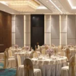 Spenta Anthea JP Road Versova Andheri West Banquet Hall With Round Table Setup Decorative Lighting