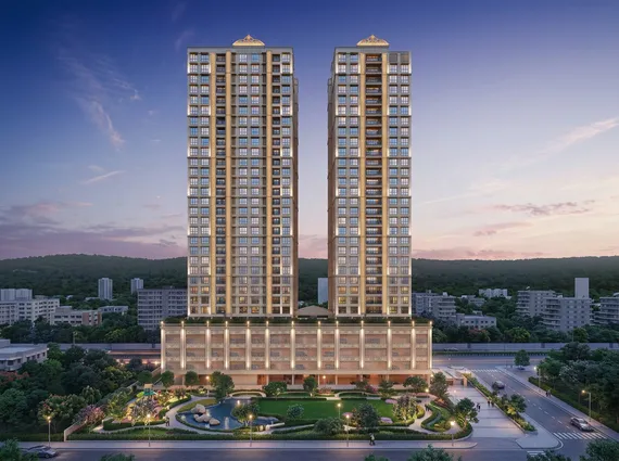 Vikas 11 Mulund West Twin High Rise Tower Landscaped Podium Fountain Dusk Lit Hill Backdrop Street Level Exterior